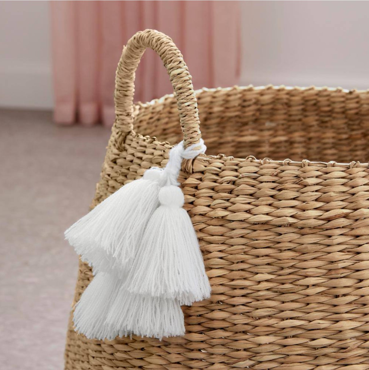 Round Natural Water Hyacinth Decorative Baskets with White Tassels (Set of 2)